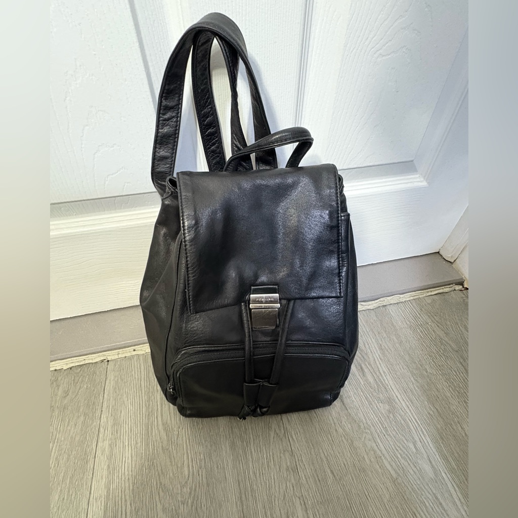 Perlina Black Leather Backpacks  Read